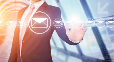 businessman touching technology interface with professional email icon