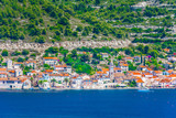 Fototapeta Łazienka - VIs coastal town landscape. / Seafront picturesque view at coastal town Vis in Croatia, popular summer travel destination.