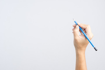 Hand holding 2B pencil with writing gesture