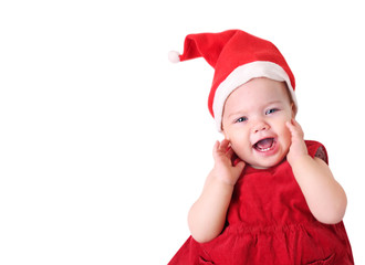 Wall Mural - Baby in santa hat isolated on white.