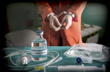 Prisoner Handcuffed To Death By Lethal Injection, Vial With Sodium Thiopental And Syringe On Top Of A Table, Conceptual Image