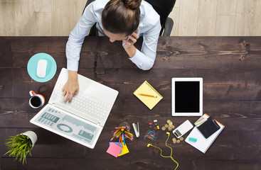 Businesswoman Working At Notebook