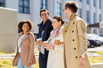 Canvas Print - office workers with coffee on city street