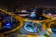 Aerial drone view of roundabout in Katowice at night.
