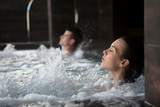 Couple relaxing in spa