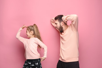 Wall Mural - Young father with his baby daughter