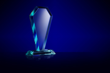 blank glass crystal award mock up stand with the blue gradient background