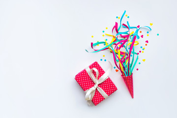 Wall Mural - celebration,party backgrounds concepts ideas with colorful confetti,streamers and gift box.flat lay
