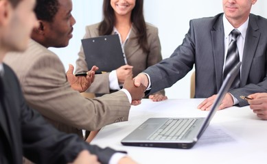 Wall Mural - handshake business partners at a business meeting