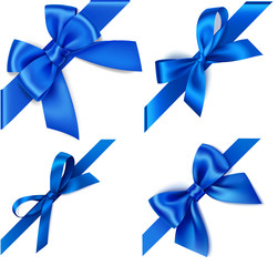 Wall Mural - set of decorative blue bows with diagonally blue ribbon on the corner isolated on white. winter holi