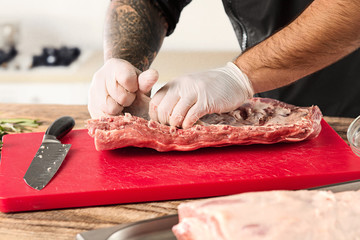 Sticker - Man cooking meat steak on kitchen