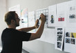© Rawpixel.com - Startup businessman  working on a board