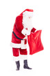 © Mediaphotos - Portrait of Christmas character Santa Claus in traditional costume with red sack on white background