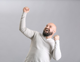 Poster - Overweight young man on light background