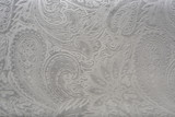 Fototapeta Sypialnia - Gray or silver velvet fabric with a vintage elegant floral pattern or a luxury texture.