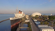 LONG BEACH, CA - AUGUST 2017: Historic Queen Mary Aerial View. This 1936 Ocean Liner And Battlecruiser Is Now A Hotel And Tourist Attraction Docked In Long Beach Harbor