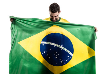 Wall Mural - Brazilian fan celebrating on white background