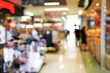 © zerotwo - blurred image people in shopping mall with bokeh.