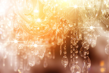 Wall Mural - Luxury crystal chandelier close-up. Glamour background with copy space