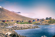 Greenland : bay with an inuit village, colored houses bay with an inuit village
