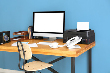 Poster - Comfortable workplace with computer monitor on table in office