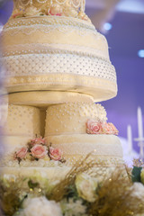 Wall Mural - White wedding cake with flower decorate
