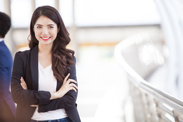 Successful business woman looking confident and smiling, success professional concept