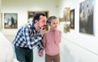 © JackF - interested father and daughter regarding paintings in museum
