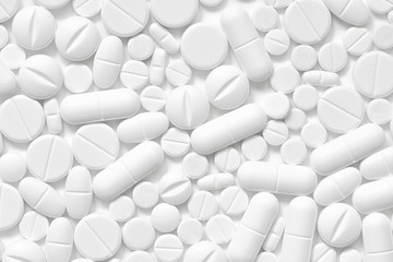white pills, white background