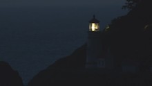 Heceta Head Lighthouse Medium At Night With Rotating Light Flare