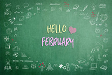 Hello February Greeting On Green School Teacher's Chalkboard With Creative Student's Doodle Of Learning Education Graphic Freehand Illustration Icon For Back To School Month Concept