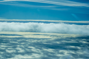 Wall Mural - Aerial plane View of cloud layers
