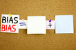 Conceptual announcement text caption inspiration showing Bias Business concept for Prejudice Biased Unfair Treatment written on Sticky Note on cork background with copy space