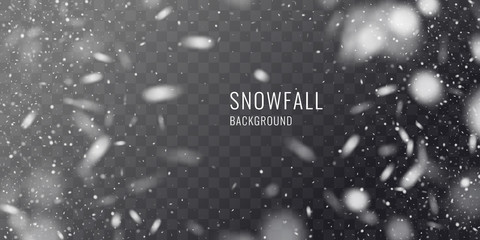 Vector realistic snowfall against a dark background. Transparent elements for winter cards