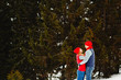 © Sunny - Young happy couple outdoors in winter park
