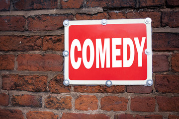 Hand writing text caption inspiration showing Comedy concept meaning Stand Up Comedy Microphone written on old announcement road sign with background and copy space