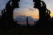 © yolya_ilyasova - Silhouette of woman full length at the balinese traditional gates at the top of Pura Besakih at sunset.