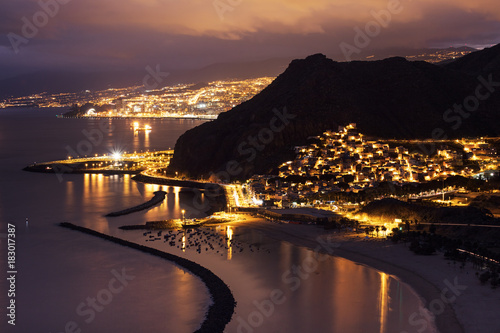 Dusk View Of Beautifully Lit San Andres Town With The Capital City Dusk View Of Beautifully Lit San Andres Town With The Capital City Santa Cruz De Tenerife