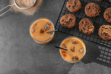 Wall Mural - Glasses with delicious iced coffee on table