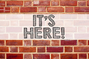 Poster - Conceptual announcement text caption inspiration showing It's Here. Business concept for advertisement written on old brick background with copy space