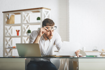 Canvas Print - White male working on project