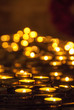 Glowing Golden Round Church Candles