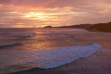 Wall Mural - Colorful sunset on ocean coastline