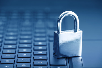 Poster - Computer security concept. Padlock on computer keyboard
