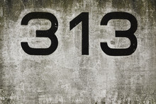 Concrete Wall With The Number 313