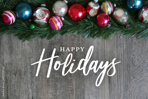 Obraz na plátně Happy Holidays Calligraphy with Festive Colorful Holiday Christmas Ornament Bord