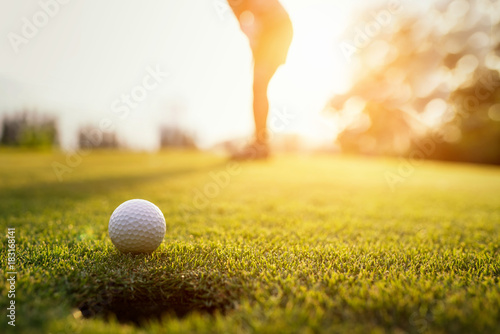 Fotografía Golfer action to win after long putting golf ball on the green golf