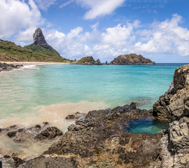 Wall Mural - Buraco do Galego (Galego Hole) at Praia do Cachorro Beach with Morro do Pico on background - Fernando de Noronha, Pernambuco, Brazil.