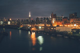 Fototapeta  - night landscape of New York Manhattan reflected in water industrial landscape
