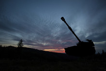 War Concept. Military Tank Silhouette Scene On Sky Background